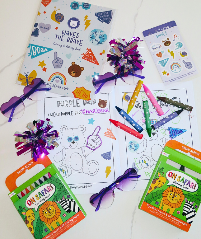 Children's activity packs with coloring books and markers on a white background